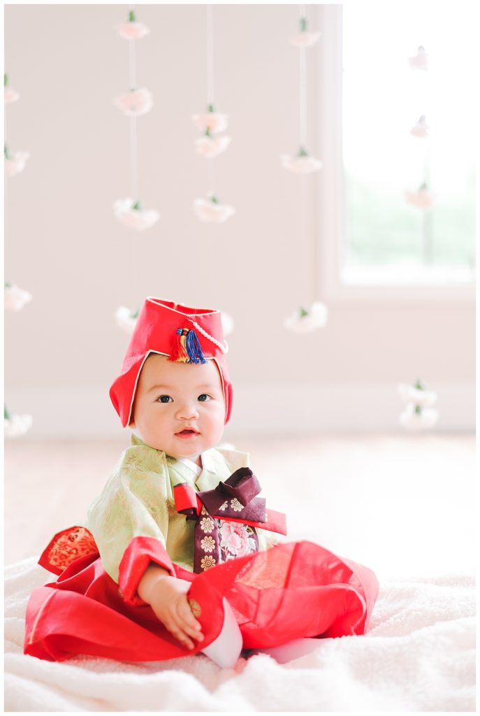 baby in hanbok floating floral wall