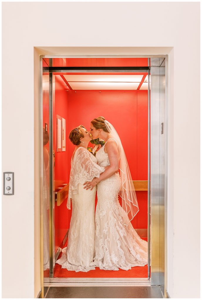 elevator wedding couple at the durham hotel