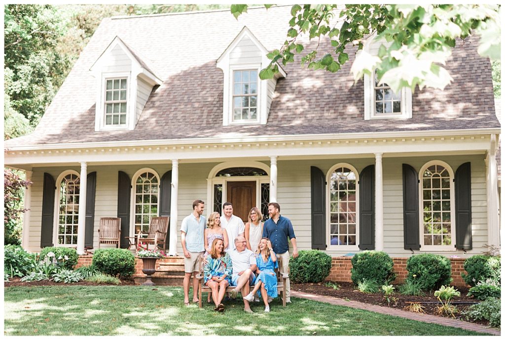family in front of house in durham, nc
