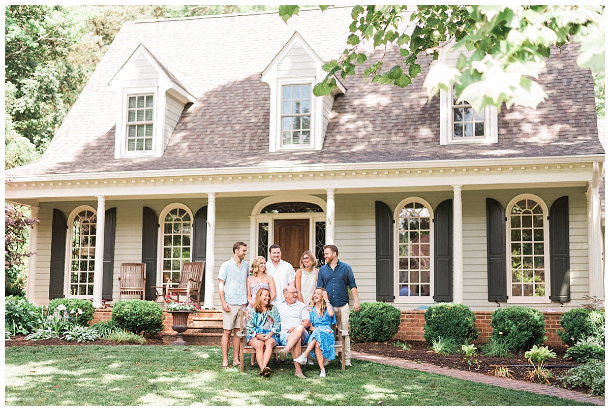 family in front of house in durham, nc