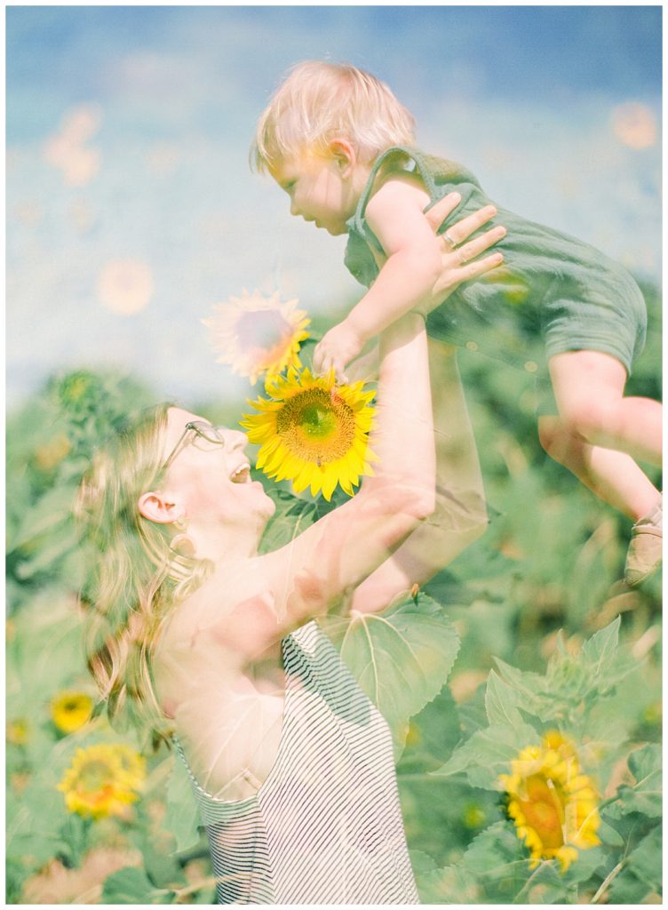 double exposure of mom with baby in sunflower field