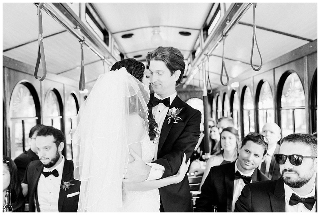 bride and groom on raleigh trolley