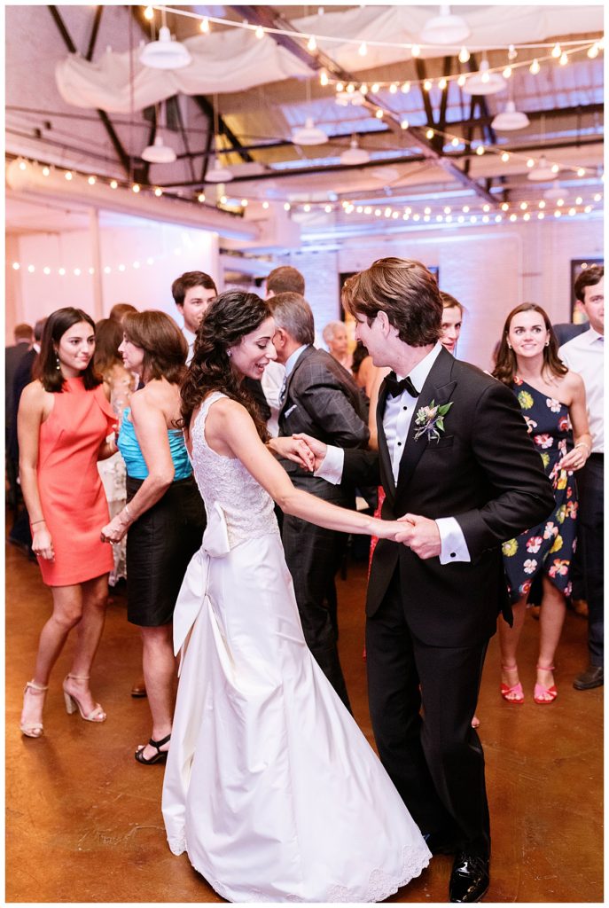 bride and groom dancing