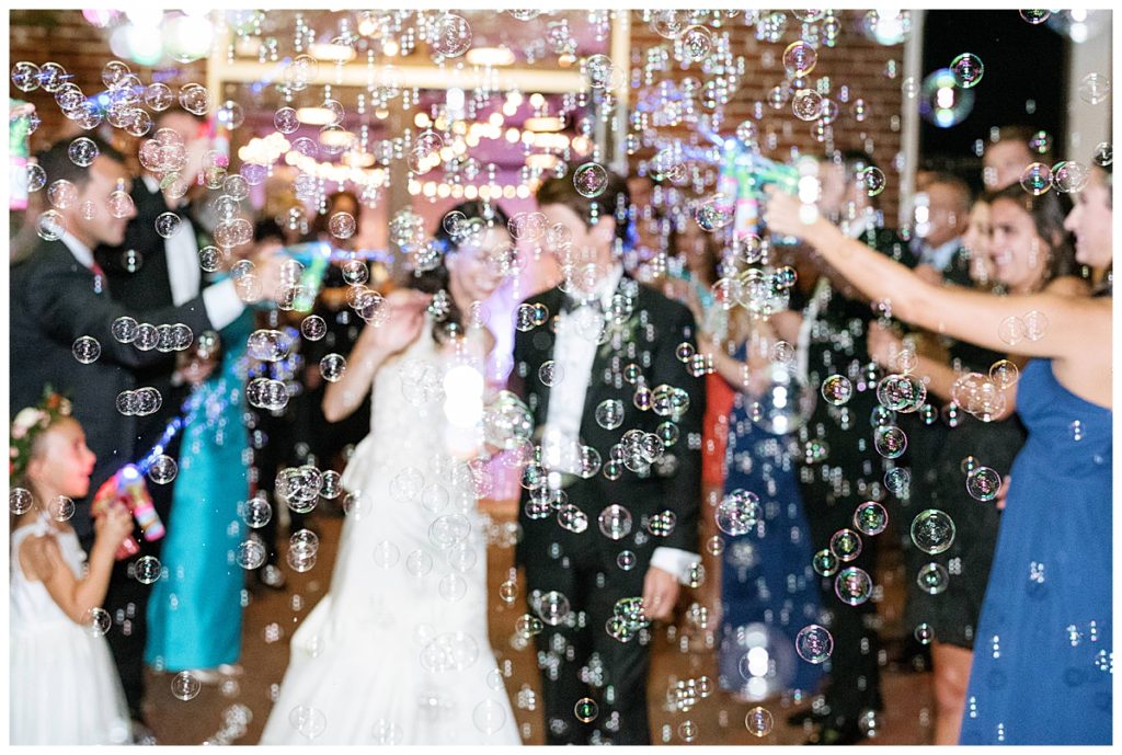 bride and groom bubble exit