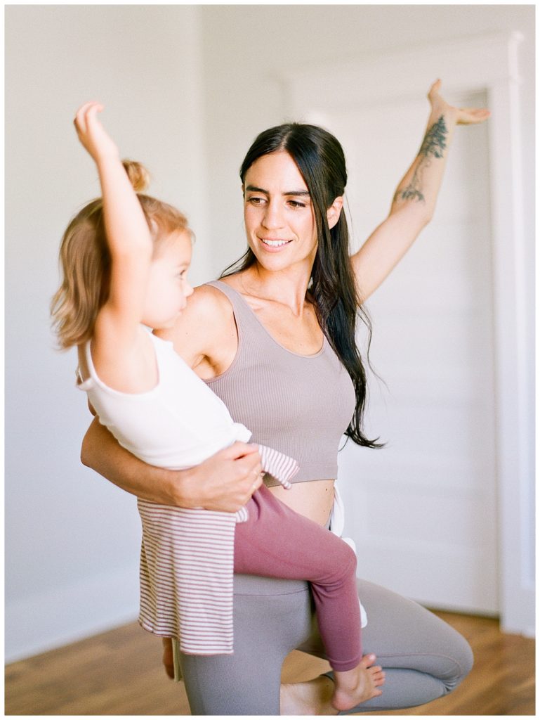 saturday morning lifestyle mother and daughter doing yoga