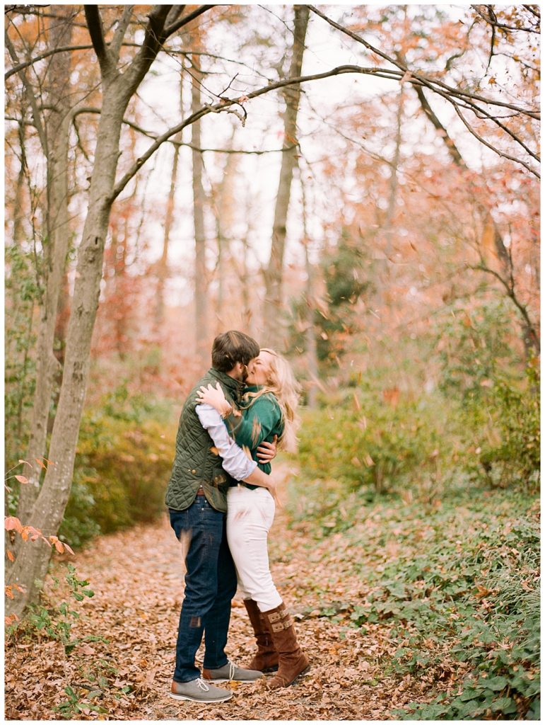 fall engagement session leaf fight
