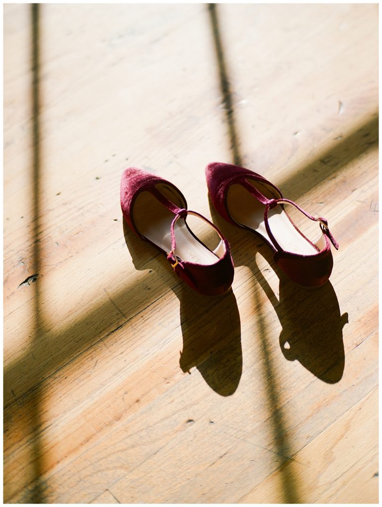 bride's shoes at forest hall at chatham mills
