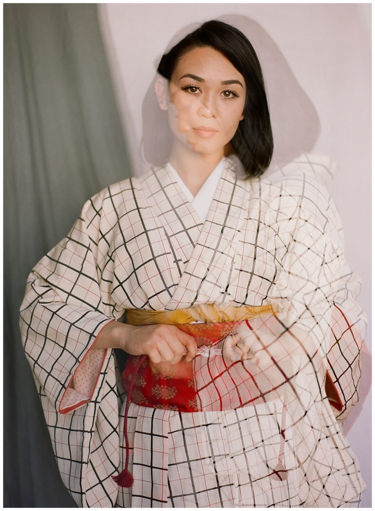 double exposure woman getting dressed in kimono