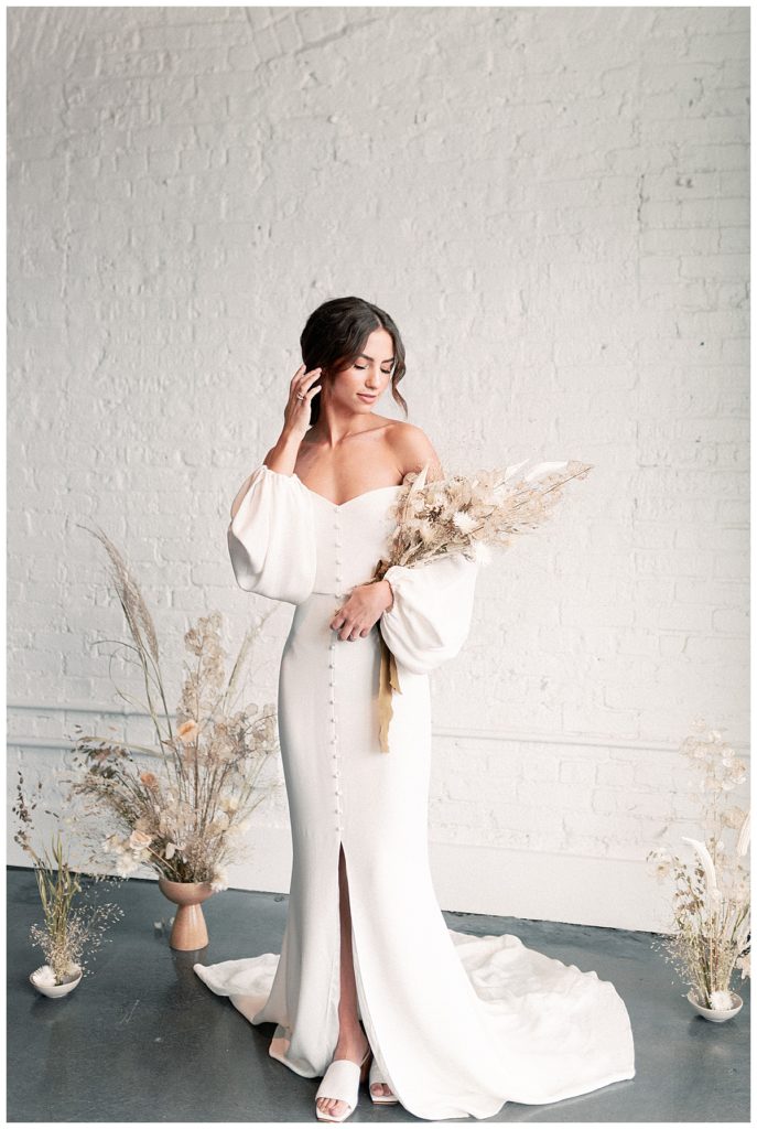 bride at junction west with dried bouquet