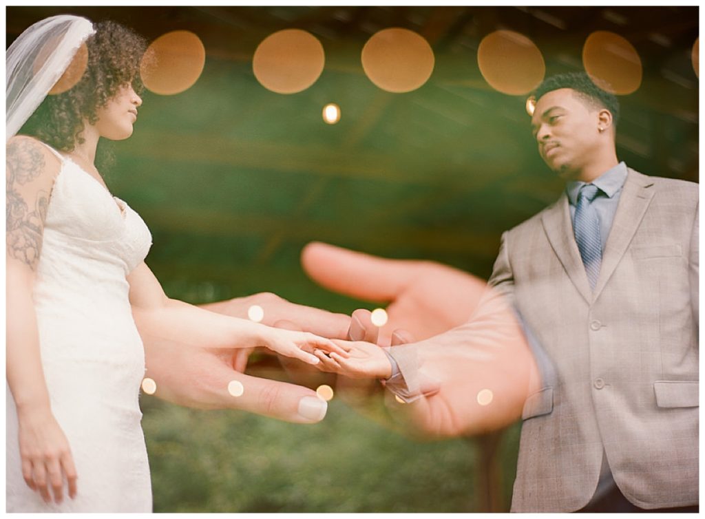 bride and groom holding hands