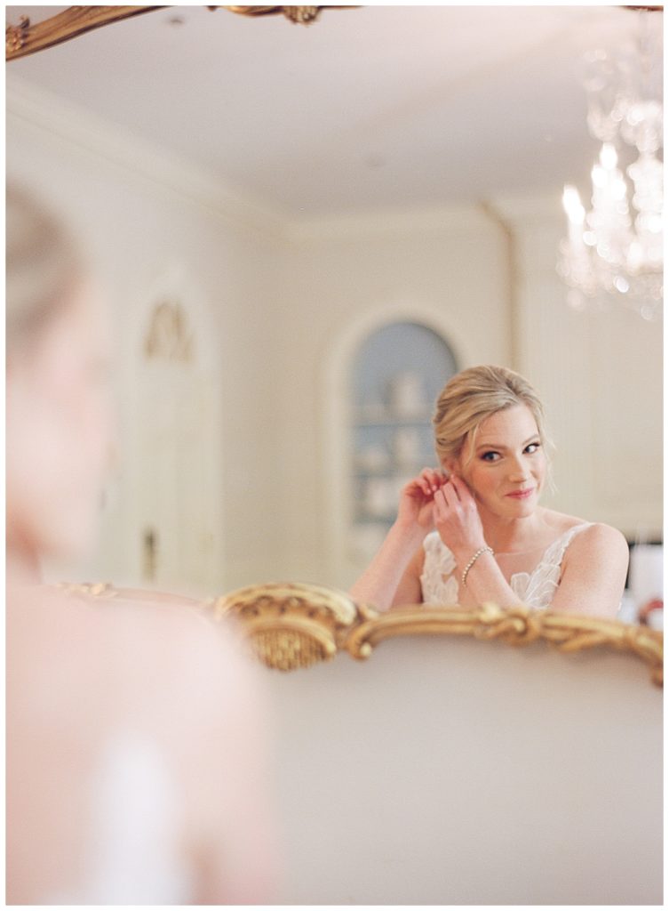 Bride Puts on Earrings at Chapel Hill Wedding