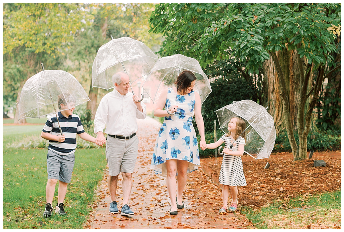 Family walking in the rain in Chapel Hill