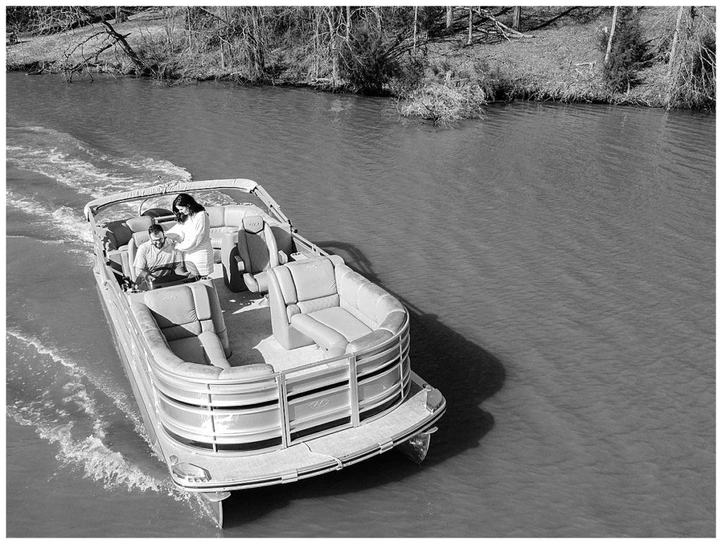 drone photo of couple on boat