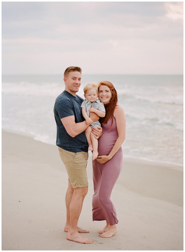 Family at sunrise on the beach