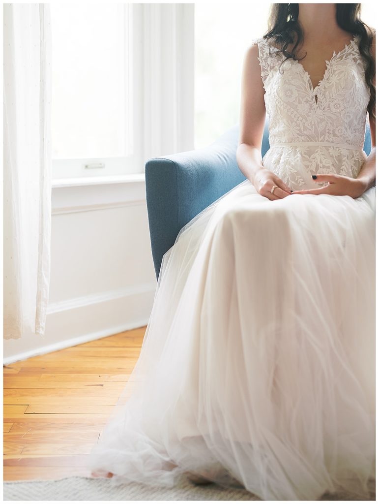 bride sitting in wedding dress