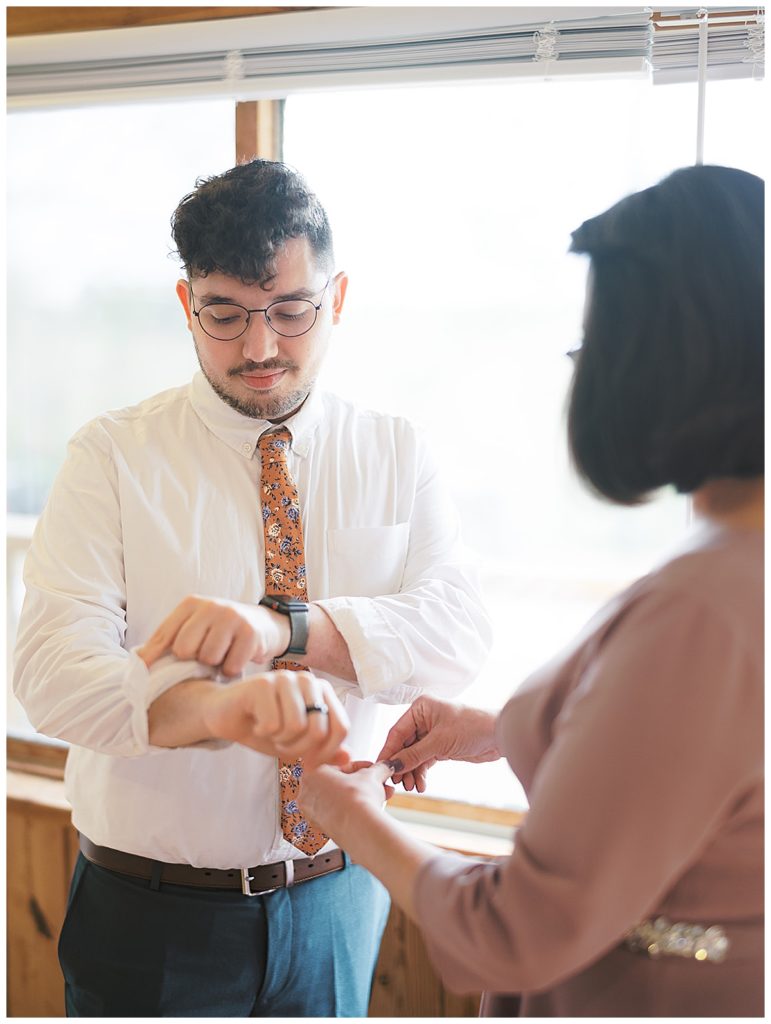groom getting ready for wedding day