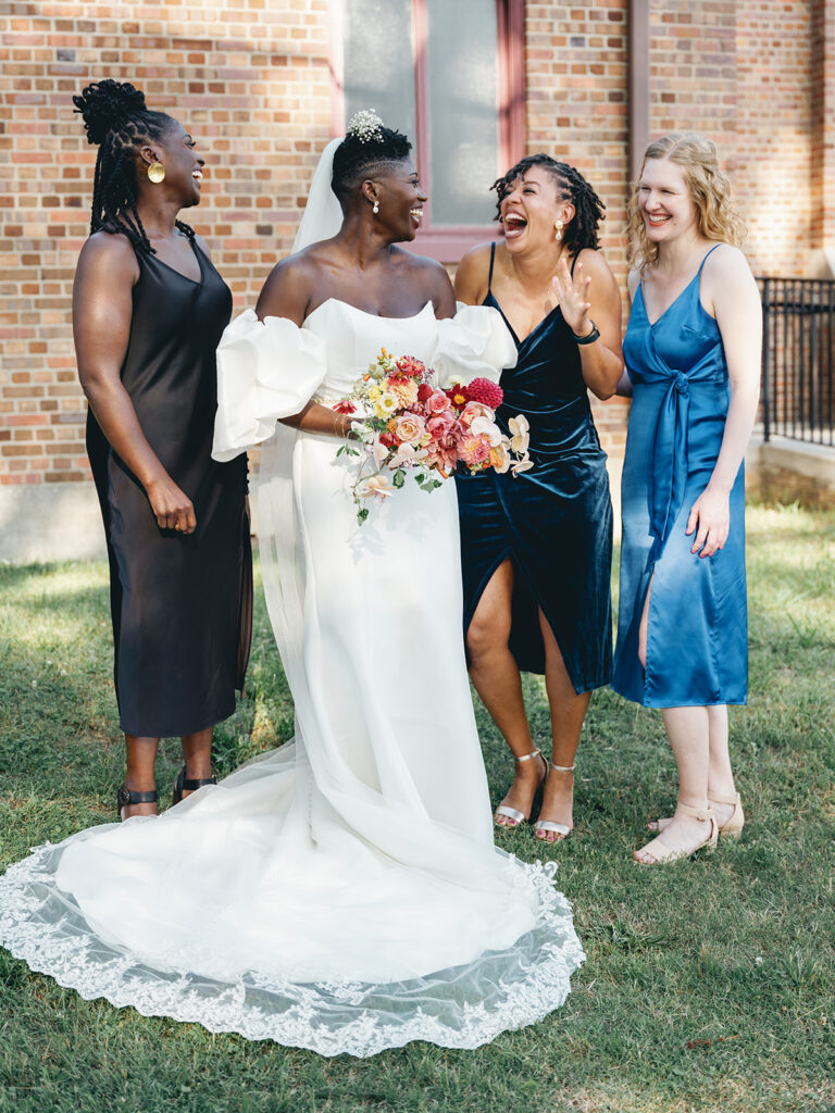 portrait of bride with her friends after ceremony